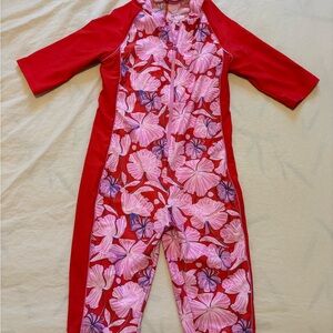 Coolibar Red and Pink Floral Kids' Swimsuit “Barracuda Neck-to-Knee Surf Suit”